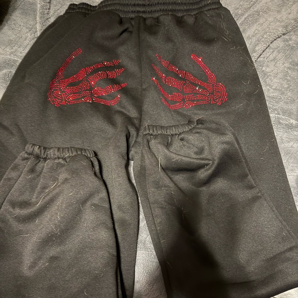 SHEIN Black Joggers with Red Skeleton Design